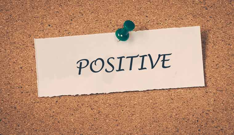 positive note on pinboard