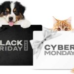 Dog and cat behind shopping bags with black friday and cyber monday