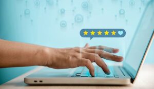 Customer Experiences Concept. Happy Client Using Computer Laptop to Giving Best Review