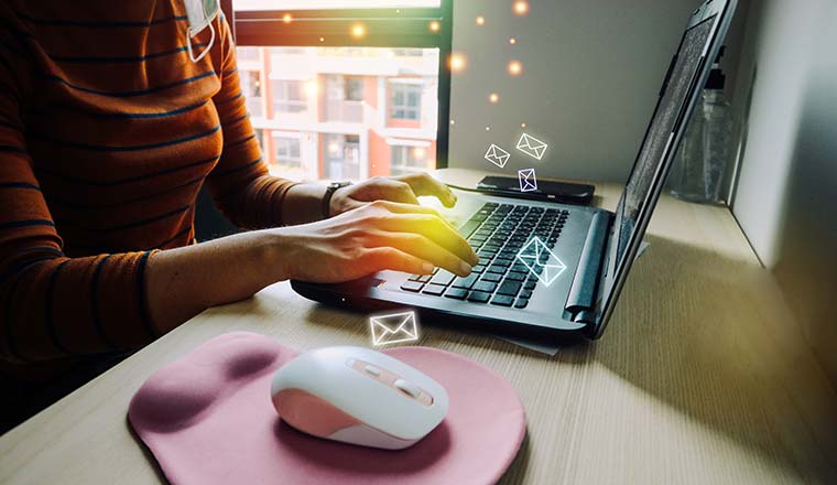 Person working at home using laptop computer