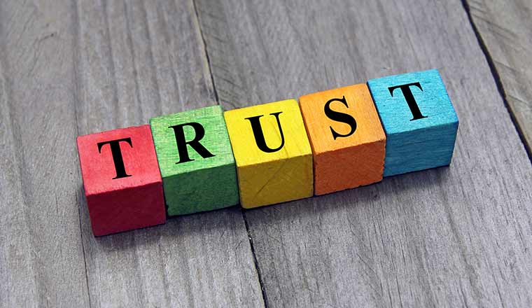 concept of trust word on wooden cubes