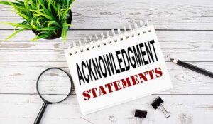 Acknowledgement Statements text written on notebook