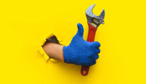 Fix CX - hand holding wrench giving thumbs up