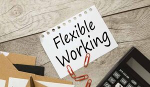 Flexible working policy concept. text on a torn page