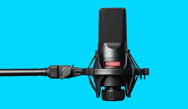 Studio microphone for recording podcasts over blue background