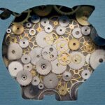Piggy bank formed by gears and cogs