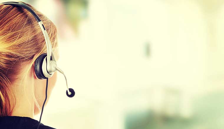 A call centre agent with headset