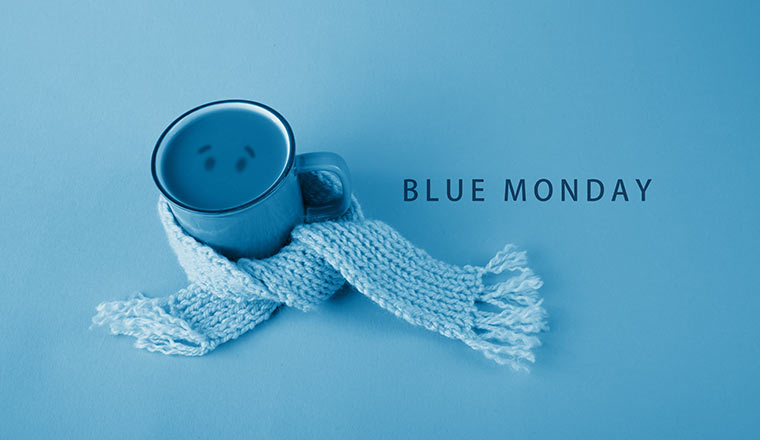 Blue monday concept - blue cup with scarf