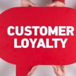 Customer Loyalty on red speech bubble