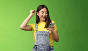 Person holding phone happy