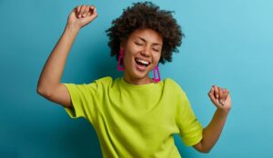 Person dancing to celebrate success