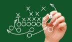 Person drawing playbook, strategy and tactics