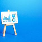 Statistics and business analytics with an easel with charts