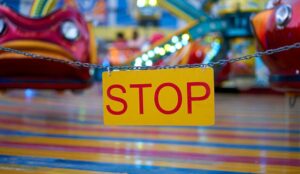 Stop sign with blurred coloured background