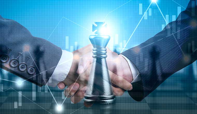 Strategic partnership concept with handshake and chess piece