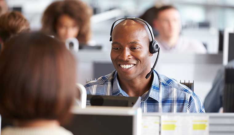 Happy engaged call centre workers