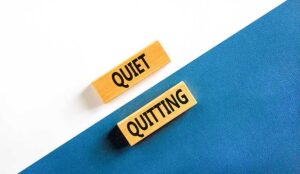 Concept words Quiet quitting on wooden blocks.