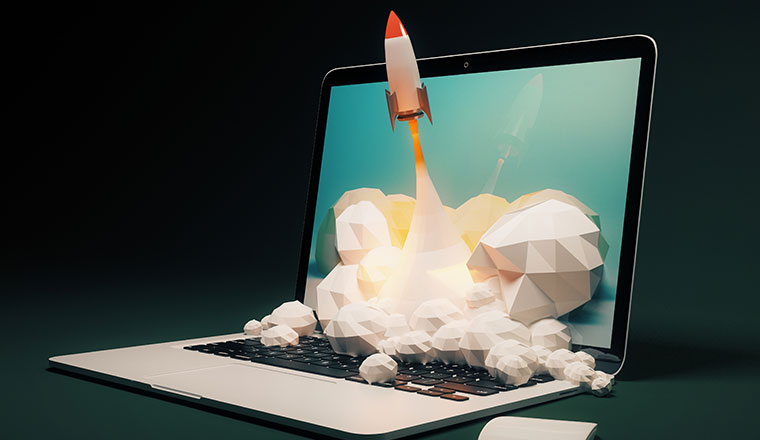 A rocket flying out of laptop screen on black background