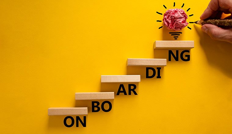 Success onboarding process symbol. Wood blocks stacking as step stair on yellow background