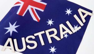 Australia in letters in front of flag