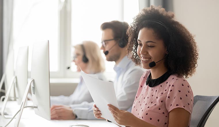 Call centre agents sat at desks