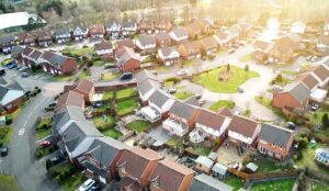 Aerial drone sunrise view of suburban houses