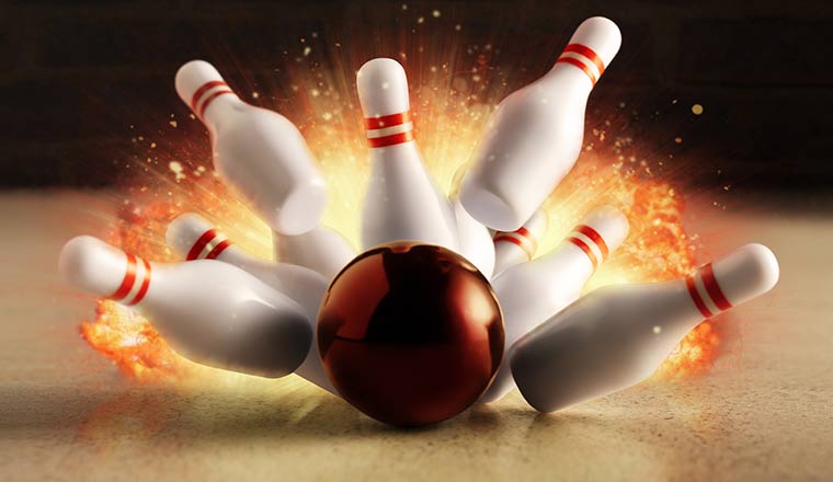 Bowling strike hit with fire explosion.