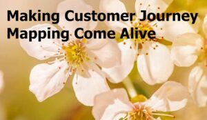Flowers coming alive with the words making customer journey mapping come alive