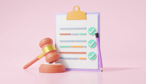 Checklist on a clipboard with a gavel - legal concept