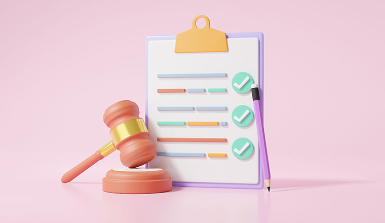 Checklist on a clipboard with a gavel - legal concept