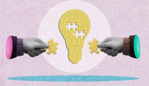 Two people put together a lightbulb jigsaw puzzle. Innovation and integration concept