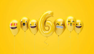 Balloons symbolising benefits with one with a number six and the others with smiley faces