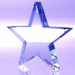 Star glass trophy on purple background - award