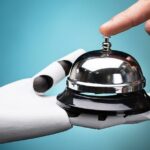 Person's Ringing Service Bell Hold By Robot - AI in customer service