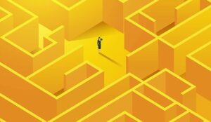 Person stands in maze - navigate challenges concept