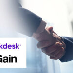 Two business people shaking hands - partnership concept