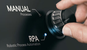 Hand turning a knob selecting RPA (Robotic Process Automation) mode