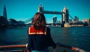 A person looking out at Tower Bridge over River Thames