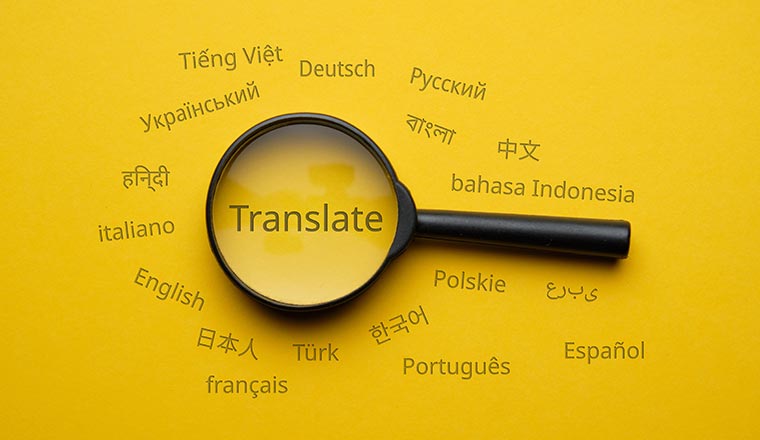 International language translation search concept with magnifying glass.