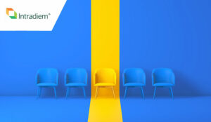 Attrition concept with empty chairs and one in yellow