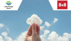 Person holding cloud against sky