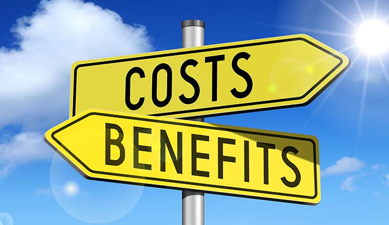 Costs, benefits on yellow road-sign