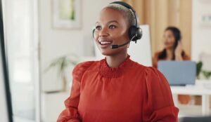 Call centre agent working at desk