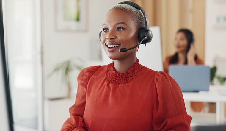 Call centre agent working at desk