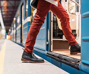 Person getting on train