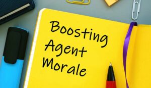 Boosting Agent Morale written on colourful notepad