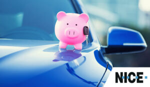 Piggy bank with keys on car - car finance concept