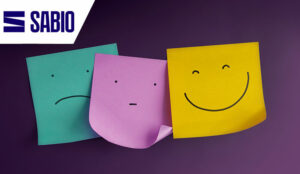 Three Emoticon Faces show on Sticky Notes from Negative to Positive - cx concept