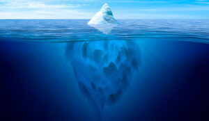 Tip of the iceberg. Underwater iceberg floating in ocean.