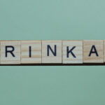 The word shrinkage made of small gray wooden letters